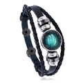 Macro shot of Virgo zodiac leather bracelet with glass charm and metal bead detailing - Virgo