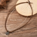 Retro men's leaf pendant necklace with adjustable brown leather cord on wooden background - Clover Style / Brown