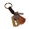Vintage leather keychain with metal razor charm and engraved motivational tag on white background - Vintage Bronze (K45)