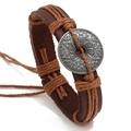 Men's retro braided brown leather bracelet featuring a vintage metal totem charm - Tan