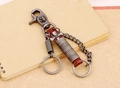 Retro punk style cowhide leather keychain with metal skulls and lobster clasp on notebook - Brown