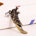 Vintage bronze dragon head pendant with claw design and antique finish for DIY jewelry - Dragon Claw Style