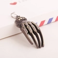 Retro punk style skeleton hand metal pendant with antique finish and embossed details - Skeleton Palm Style
