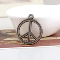 Vintage bronze peace symbol charm for DIY necklace with hollow circular metal design - Antique Silver