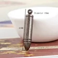 Detail showing 62mm long vintage silver bullet pendant with 10mm diameter and ring loop - Antique Silver