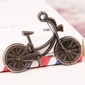 Detail view of vintage alloy bicycle pendant with dimension labels 50mm and 38mm - Bicycle Shape (A0006) / Bicycle