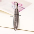 Macro view of 56mm retro silver alloy feather pendant with detailed texture - Antique Silver (A)
