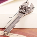 Detail view of antique silver wrench pendant with skull relief showing 65mm x 19mm size - Wrench Shape (A0006) / Wrench