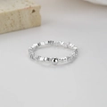 Minimalistischer Ring aus 925er Sterlingsilber mit unregelmäßiger Struktur und runder Silberperle - Einstellbar Offen / Silber