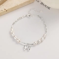 Armband aus 925er Silber mit Perlen und stilvollem Schleifenanhänger im Design - 925er Silber / Silber