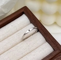 Minimalist 925 sterling silver ring with black engraved letter K on flat surface - Adjustable Open / Letter K