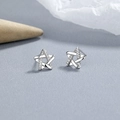 Star-shaped 925 sterling silver stud earrings with one polished and one paved star - White Gold / Star