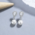 Orecchini a goccia in argento 925 con perla bianca e brillanti pietre di zircone - Oro Bianco