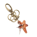Llavero vintage de bronce con estrella de cuero y mosquetón para bolsos de mujer - Estilo Estrella (K92)