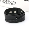 Punk wide black braided leather bracelet with dual metal snap buttons on a white background - Black