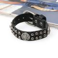 Retro punk black leather bracelet featuring silver rivets and a bull skull metal emblem - Black