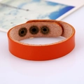 Orangefarbenes Lederarmband mit verstellbaren Bronzedruckknöpfen im Retro-Punk-Stil - 21.5 / Orange