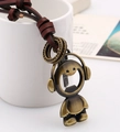 Vintage bronze cartoon robot necklace with brown leather cord and bottle opener feature - Dark Brown Leather Cord