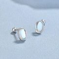 Elegant 925 sterling silver oval moonstone stud earrings with secure screw back design - 925 Silver / White Gold