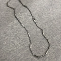 Collana Möbius in acciaio al titanio con maglie a stella e design minimalista moderno - Collana Mobius (L628-A)