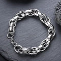 Minimalist silver steel chain bracelet with textured links on a dark rock background - Hollow Out Chain (S755-A)