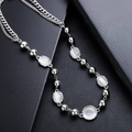 Silver necklace with opal gemstones and double-layer chain design on black background - Cat Eye Stone Necklace Style (L672-A)