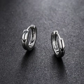 Polished silver punk hoop earrings with black crown engraving on leather background - Crown Style (X183-A)