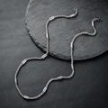 Collana in acciaio inossidabile argento con perle cilindriche e chiusura a moschettone - Stile Cilindrico Multi-Sezione (L026-A)