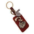 Handgefertigter Leder-Schwan-Schlüsselanhänger mit Bronze-Akzenten und Webband - Vintage Schwan Stil