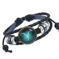 Dettaglio del bracciale Ariete in pelle intrecciata con segno zodiacale e cordini - Ariete