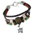 Punk leather bracelet featuring bronze skull and silver turtle charms with toggle clasp - Toggle Clasp With Skull Head