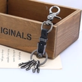 Portachiavi vintage in pelle nera e metallo argento antico con ganci multipli - Nero
