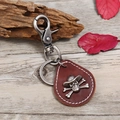 Vintage Leder Schlüsselanhänger mit Cowboy Totenkopf Anhänger und Karabinerhaken - Dunkelbraun