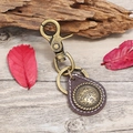 Portachiavi vintage in pelle da uomo con medaglia in ottone e robusto gancio in metallo - Marrone Scuro