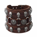 Wide brown leather punk wristband with silver skull studs and pirate charms on white background - Dark Brown