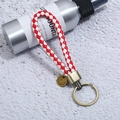 Detail of red and white braided leather keychain with vintage bronze metal ring and tag - Single OPP Bag Packaging / Red & White