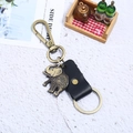 Vintage elephant alloy keychain with black leather strap and bronze lobster clasp - Black