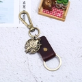 Portachiavi vintage in pelle testa di lupo in bronzo con ciondolo in metallo rustico - Marrone
