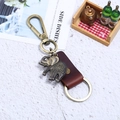 Retro bronze elephant keychain with dark brown leather strap and sturdy metal carabiner - Brown