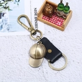 Vintage-Schlüsselanhänger mit Bronze-Baseballkappe, schwarzem Leder und Karabiner - Schwarz