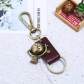 Portachiavi mappamondo retrò in bronzo con cinturino in pelle e robusto gancio a molla - Marrone