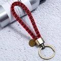 Detail of red and black braided leather keychain with vintage bronze metal ring and tag - Single OPP Bag Packaging / Black Red