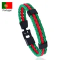 Dettaglio del bracciale in pelle intrecciata Portogallo con cordini rosso-verdi e chiusura - Stile Portogallo