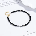 Minimalist 925 sterling silver bracelet featuring faceted black agate beads and gold spacers - 925 Silver / Gold
