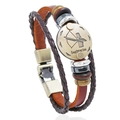 Detail of hand-woven leather Sagittarius bracelet with bronze charms and wooden beads - Sagittarius