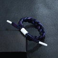 Close-up of braided blue and purple bracelet with DPANCO logo buckle and slider - Iridescent with White Buckle