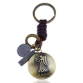 Vintage braided leather keychain with Virgo zodiac relief and inspirational metal charms - Virgo