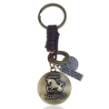 Retro Capricorn zodiac leather keychain with antique bronze medallion and woven details - Capricorn