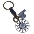 Vintage geflochtener Leder-Schlüsselanhänger mit Sonnenanhänger und Metallplakette - Antiksilber