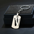 Detail showing letter V stainless steel keychain with brushed metal plate and gift box - Letter V / Silver